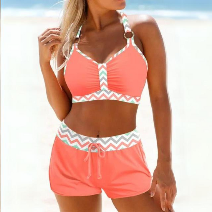 Trendy dames zwemset, nautische bikini in blauw/roze, comfortabele strandkleding voor een zomerlook.