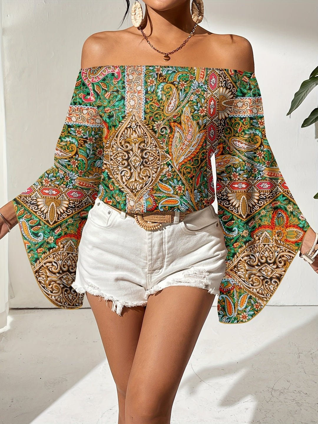 Luchtige off-shoulder blouse Noémie, geometrische print, comfortabel voor de zomer en lentemode.