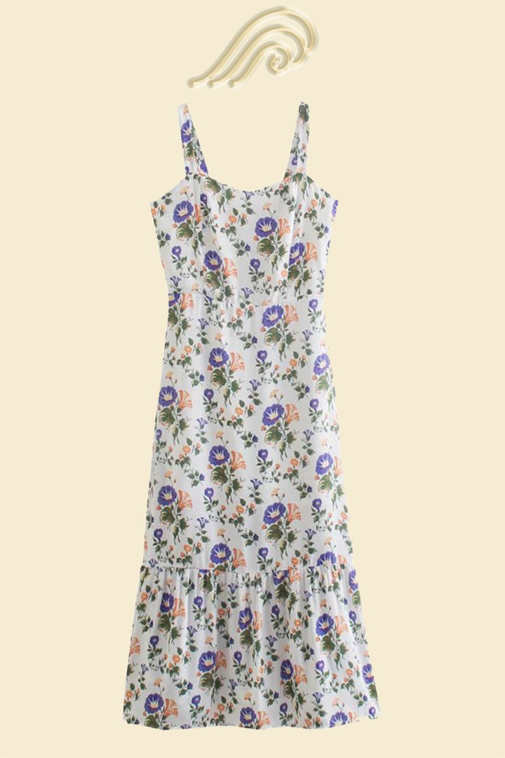 Veelzijdige Norelle midi-jurk voor dames met bloemenprint. Uitlopende bandjesjurk, ideaal voor casual en chique gelegenheden.