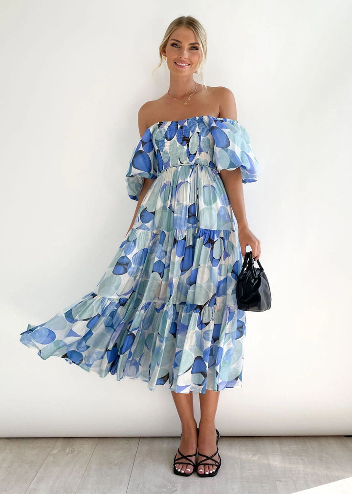 Trendy dames off-shoulder midi-jurk met ruffles, een must-have voor elke zomerse damesmode collectie.