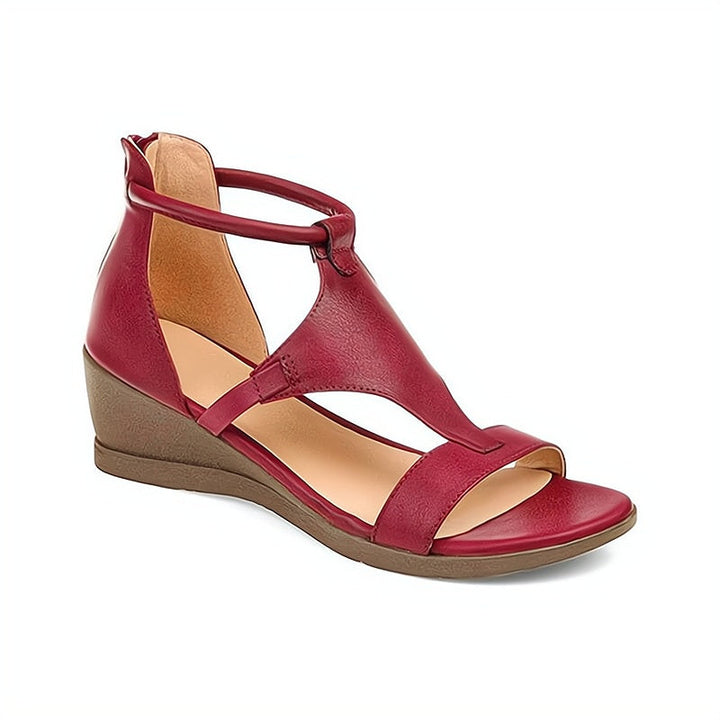 Functionele dames orthopedische sandalen met T-band, wigzool en ritssluiting voor ultiem zomercomfort.