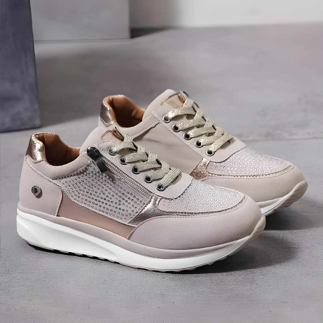 Stijlvolle grijze dames orthopedische sneakers, perfecte combinatie van comfort en mode voor wandelingen.