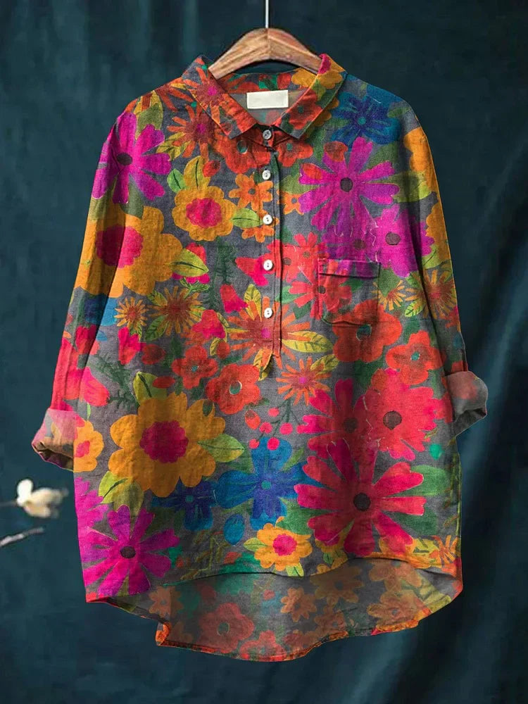 Dames oversized bloemen overhemd met levendige multicolor print, lange mouwen en knoopsluiting voor zomerlook.