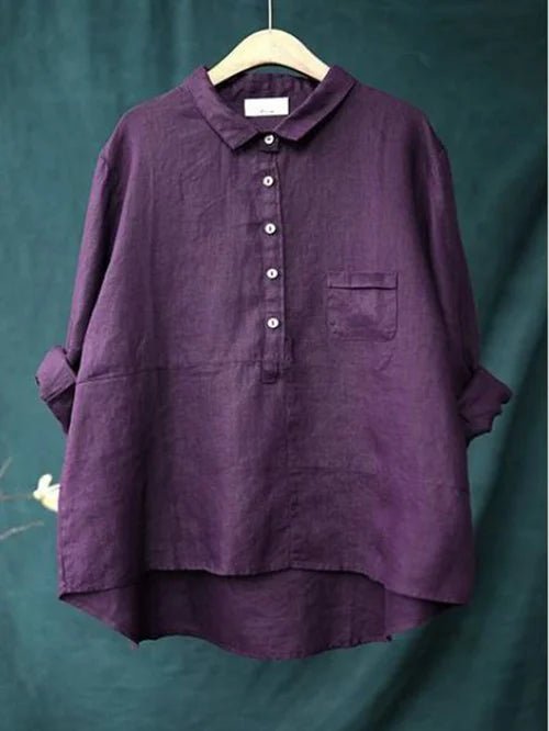 Veelzijdige damesblouse met lange mouwen, button-down design en modieuze hoge-lage zoom. Combineer chic en casual.