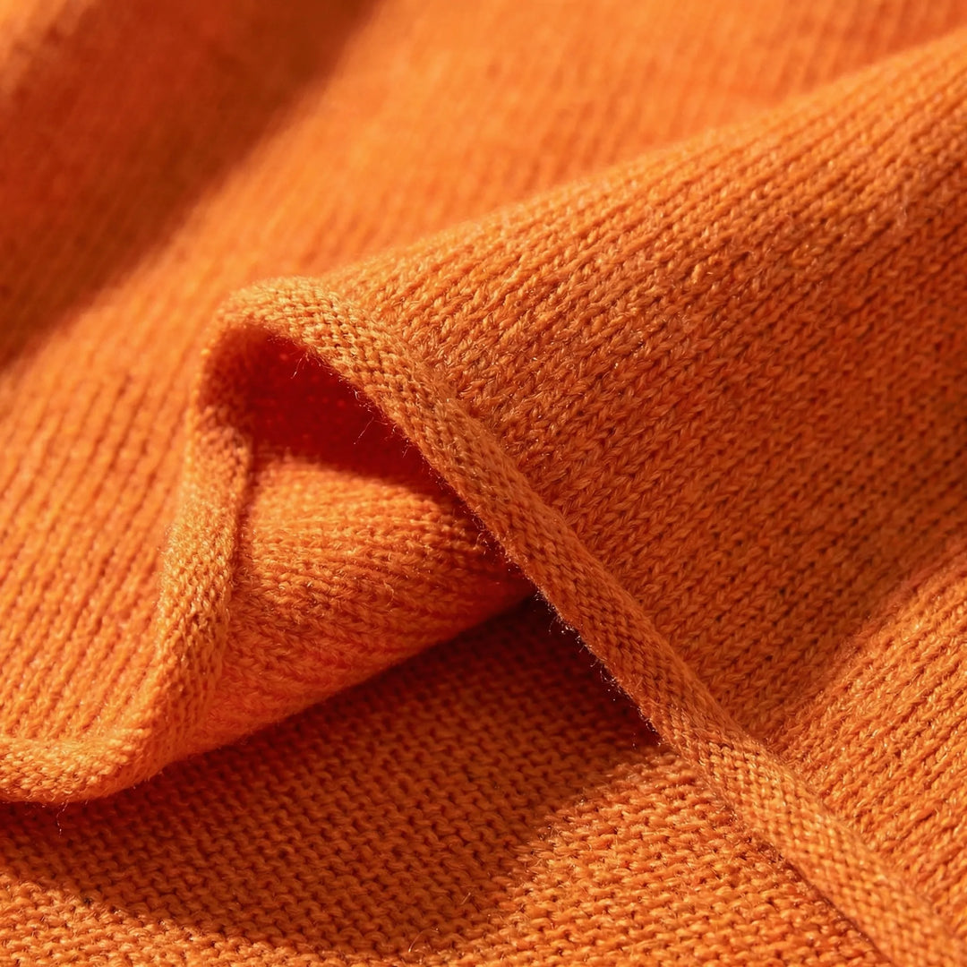 Zachte polyester dames oversized trui met V-hals, biedt ultiem comfort en een relaxte pasvorm met lange mouwen.