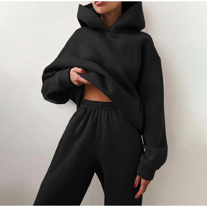Trendy dames oversized trainingspak met hoodie & broek, geschikt voor sport of casual dagen.