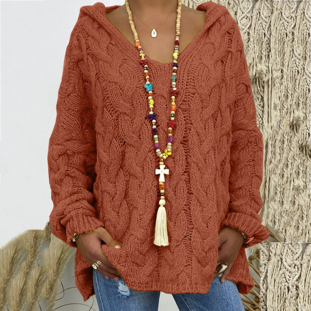 Comfortabele oversized dames trui met V-hals en unieke kabelgebreide textuur. Ideaal voor koude dagen.