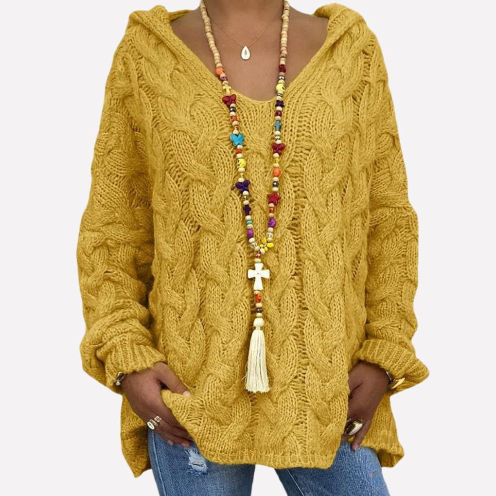 Dames oversized trui, kabelgebreid, met V-hals, gedragen als comfortabele herfstoutfit. Perfecte wintertrui.