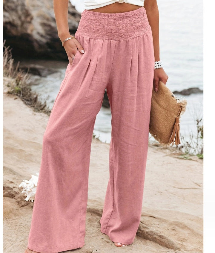 Vakantieklare dames palazzo broek met boho print. Comfortabele pasvorm en trendy wijde pijpen.
