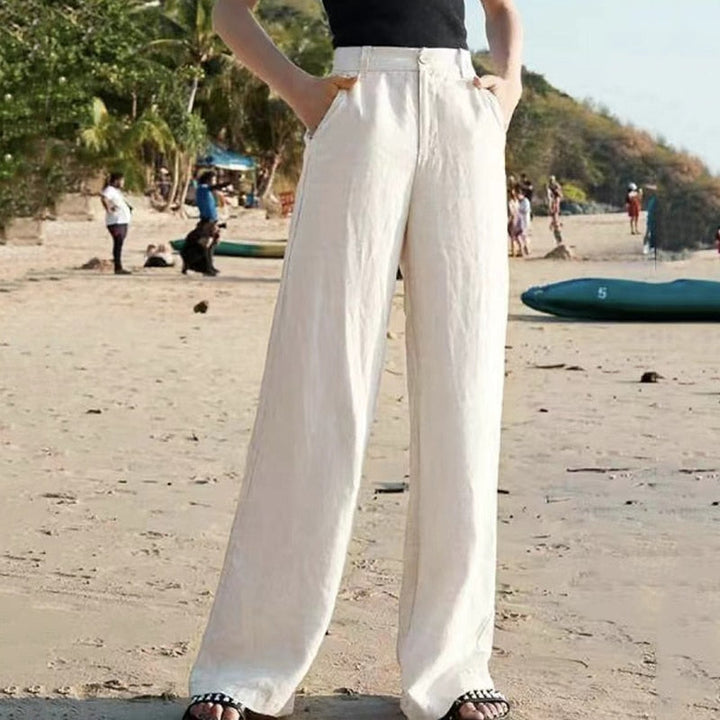 Witte dames pantalon Diana, elegante broek met wijde pijpen en hoge taille. Perfect voor een frisse, zomerse outfit.