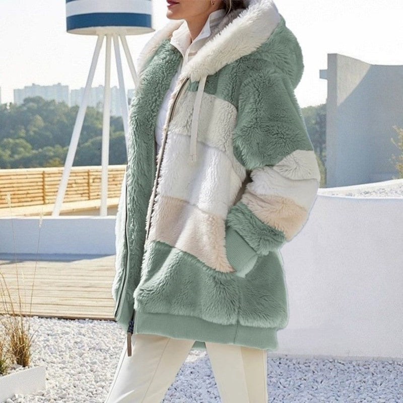 Damesmode: comfortabel pluche vest met capuchon, zacht en warm, voor een casual stijl.