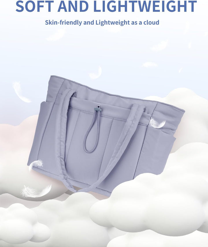 Essentiële werktas voor dames: ruime puffer tote met laptopvak.