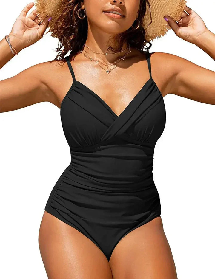 Corrigerend dames badpak met push-up en elegante V-hals. Zwarte zwemkleding.