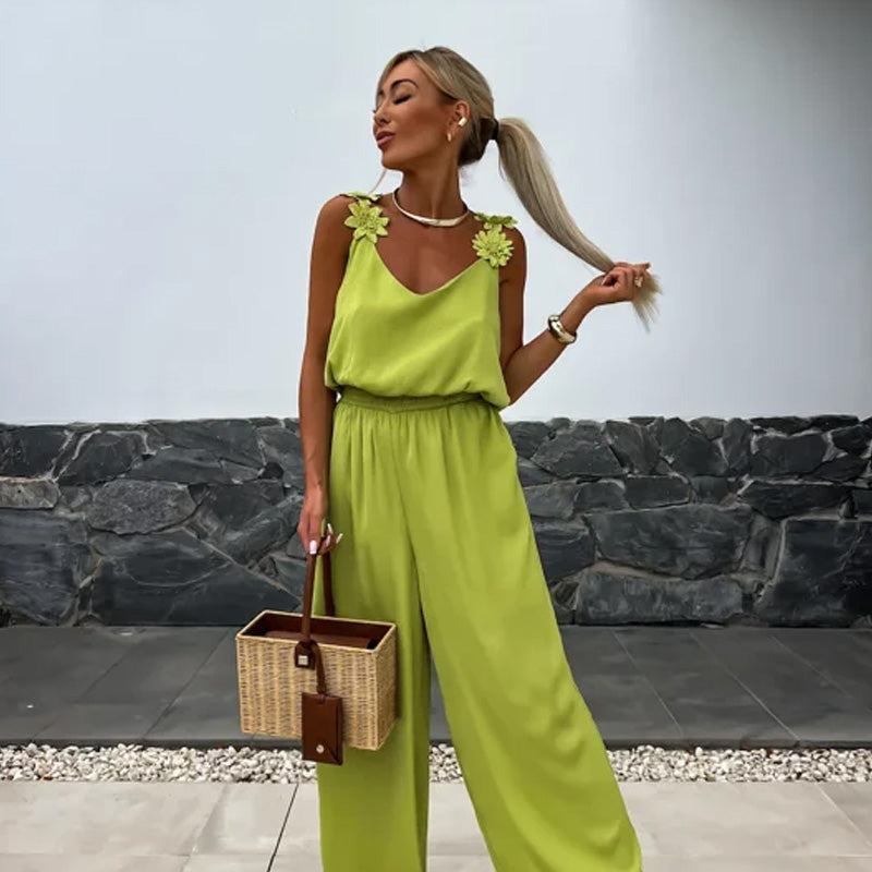 Dames rode maxi jumpsuit met V-hals en wijde pijpen, elegant en comfortabel voor zomerse dagen.