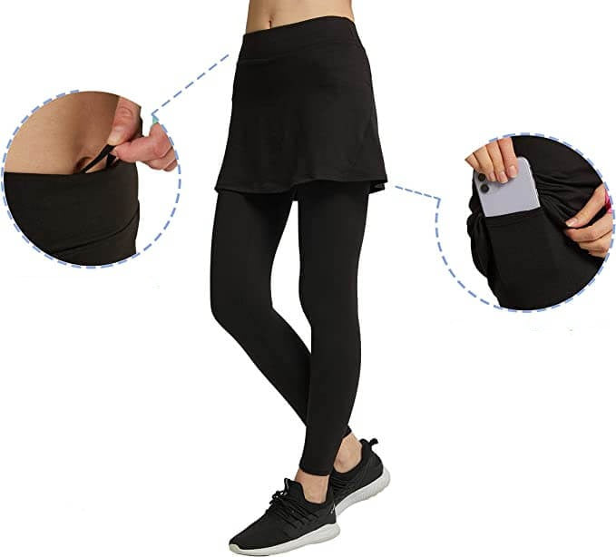 Zwarte dames roklegging met zijzakken, perfect voor yoga of fitness. Biedt comfort en bewegingsvrijheid.