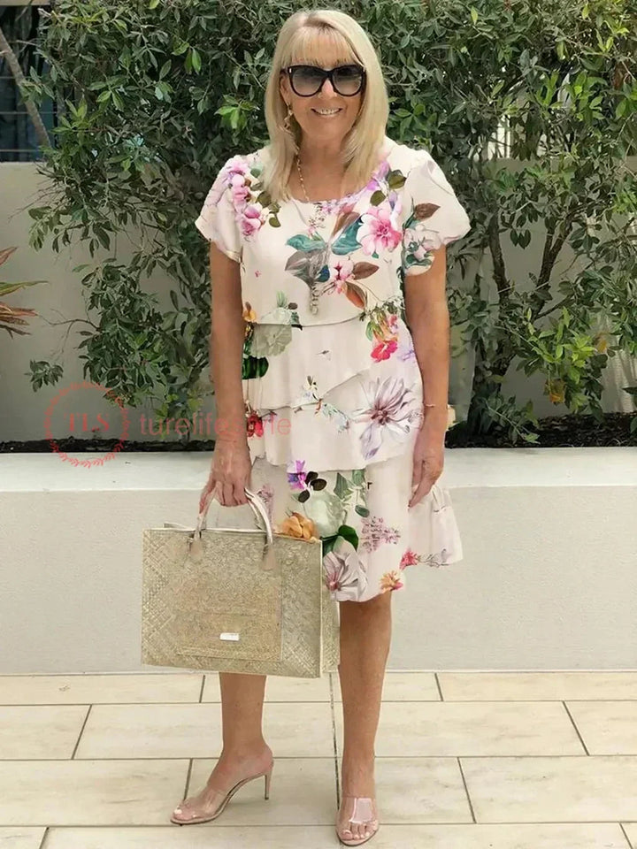 Zomerse dames gelaagde jurk met ruffle details en vierkante halslijn, een comfortabele en modieuze mini jurk.