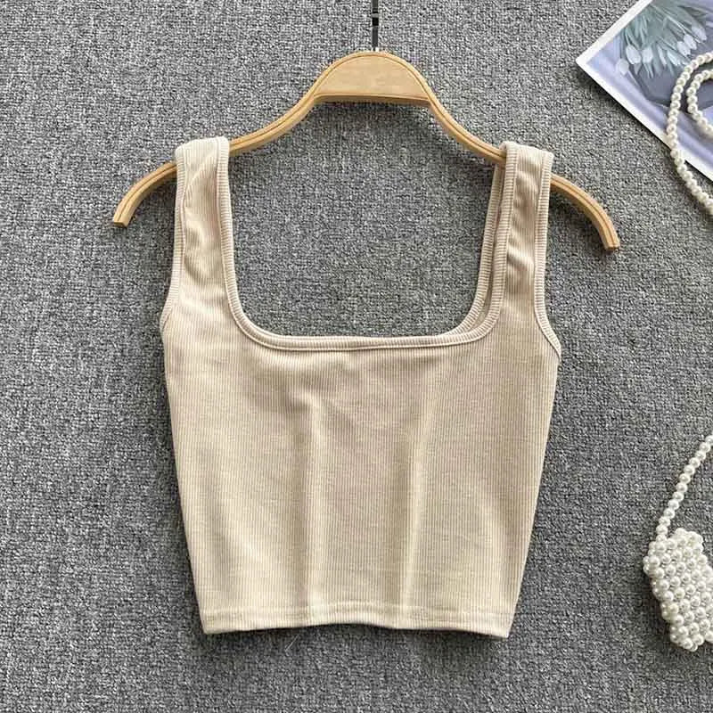 Modieuze rugloze tanktop, cropped model voor dames. Effen kleur, slim fit, ideaal voor zomerfestivals.