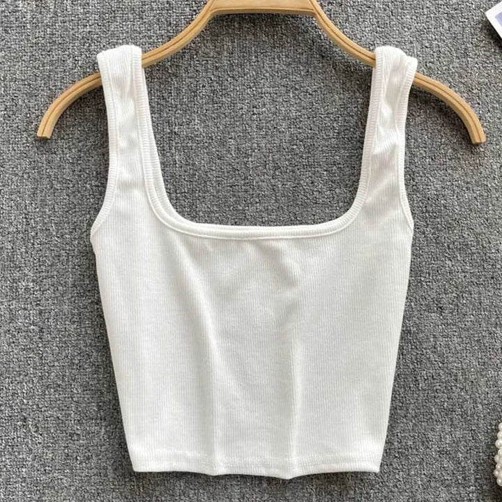 Stijlvolle rugloze tanktop voor dames, cropped model. Veelzijdige zomer top in effen kleur.