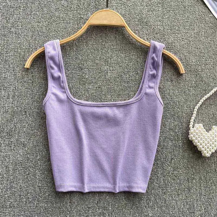Korte tanktop rugloos, effen kleur. Comfortabele slim fit zomer top voor vrouwen.