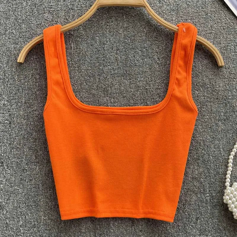 Veelzijdige rugloze cropped tanktop Zayra voor dames. Elegante effen kleur, slim fit.