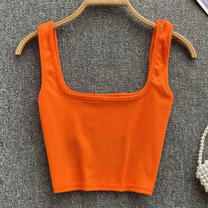 Veelzijdige rugloze cropped tanktop Zayra voor dames. Elegante effen kleur, slim fit.