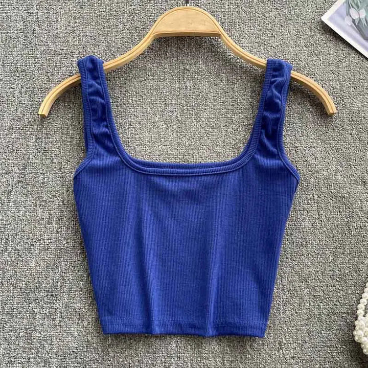 Effen kleur rugloze cropped tanktop voor dames. Stijlvolle slim fit top, ideaal voor festivals.