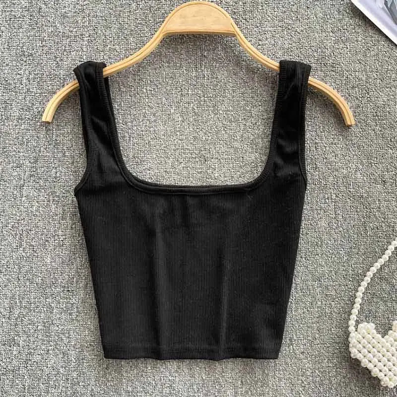 Dames kleding: rugloze cropped tanktop Zayra. Effen kleur, veelzijdig en perfect voor de zomer.