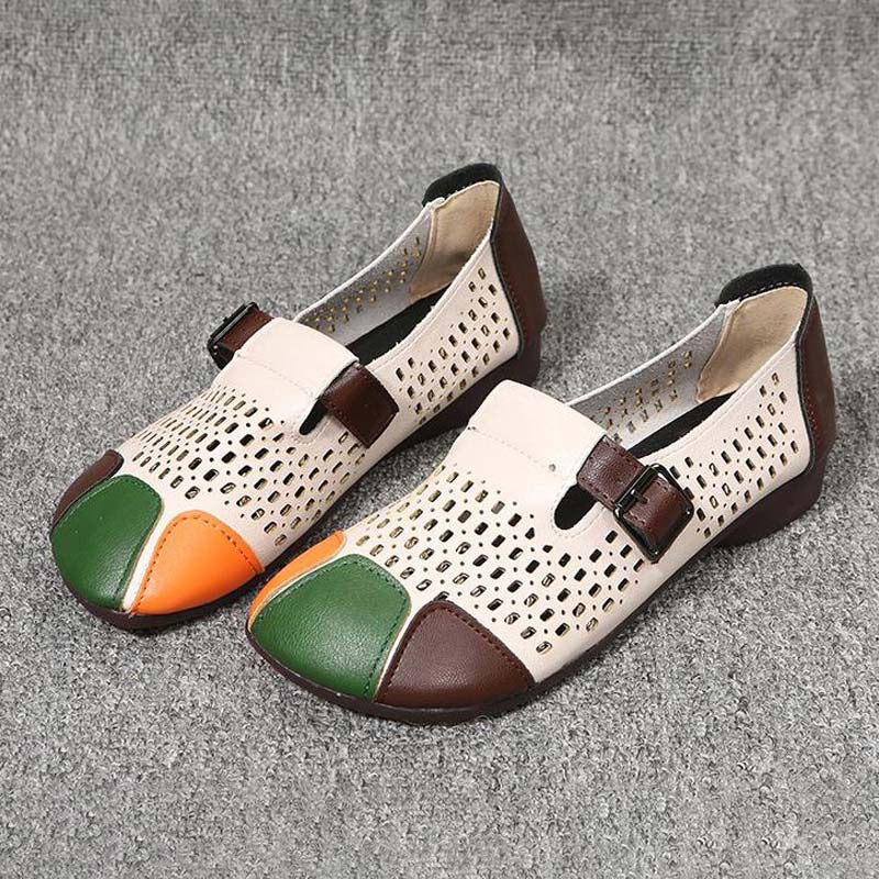 Platte sandalen damescollectie: Zoë, biedt comfort en een trendy colorblock esthetiek.