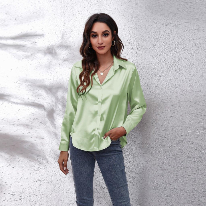 Vrouwelijke Shila blouse met lange mouwen, elegant en modern, een must-have voor dameskleding.