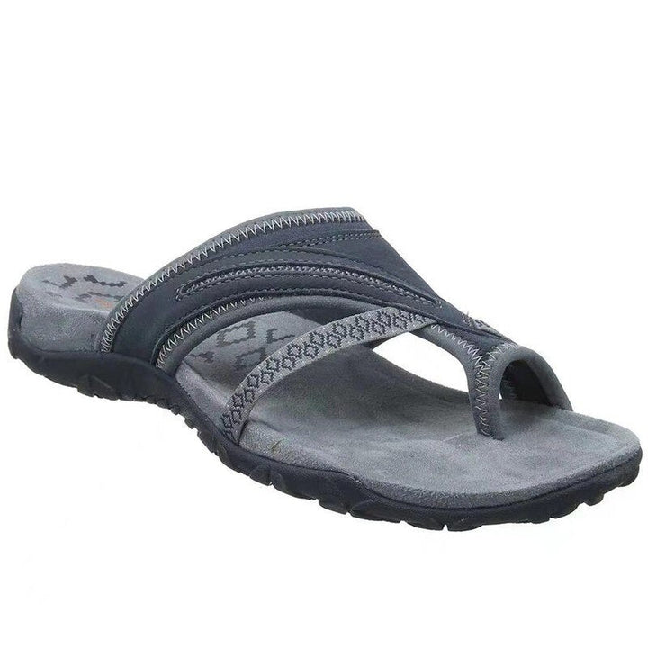 Dames slippers met ondersteunend orthopedisch voetbed, ontworpen voor langdurig draagcomfort.