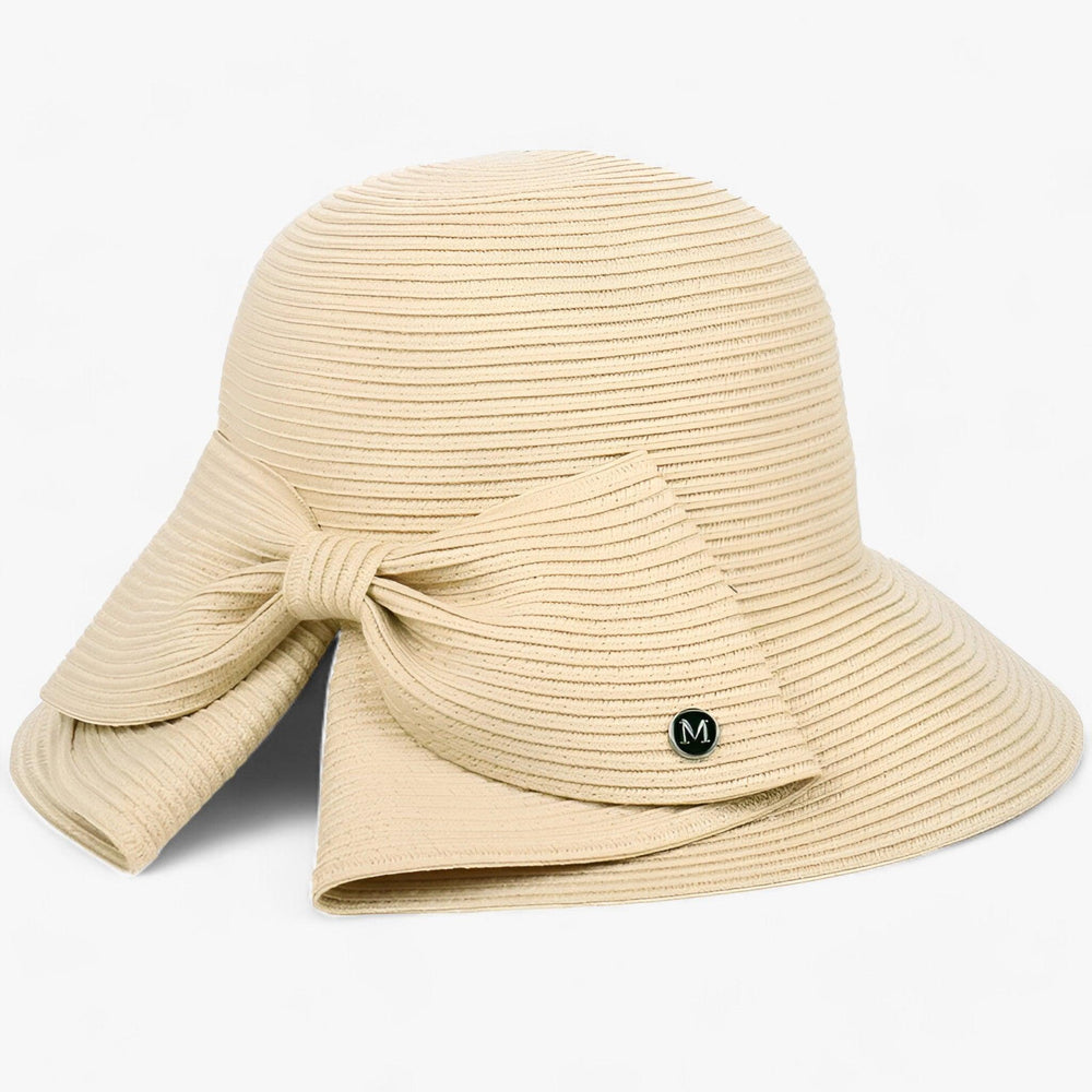 Elegante dames zonnehoed met brede rand voor optimale UV bescherming op strand of reis. Perfect zomer accessoire.