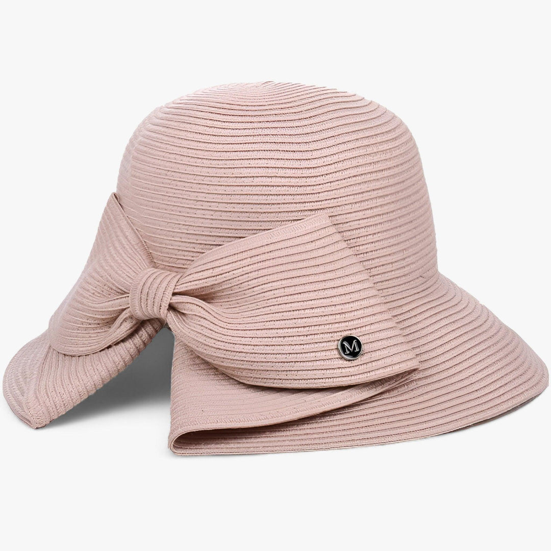 Beschermende dames zonnehoed Soléra met brede rand voor effectieve UV bescherming en een chique zomerse look.