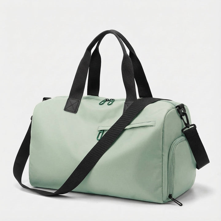 TrailGrip dames sport duffel met waterdicht schoenenvak. Robuuste gymtas voor fitness en georganiseerde reizen.