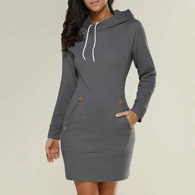 Dames capuchonjurk met zakken en lange mouwen. Een comfortabele en modieuze jurk voor alle vrouwen.