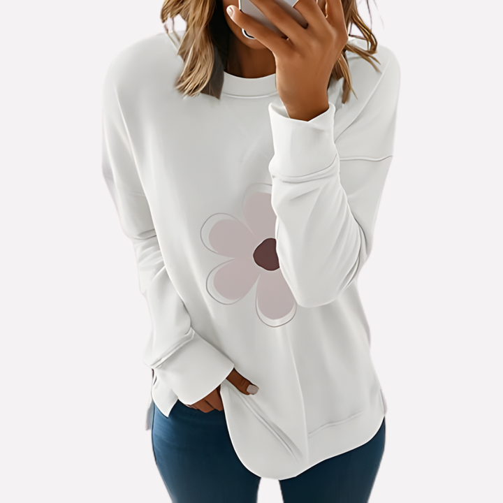 Dames sweatshirt met subtiele textuur, ronde hals, comfortabele ontspannen pasvorm.
