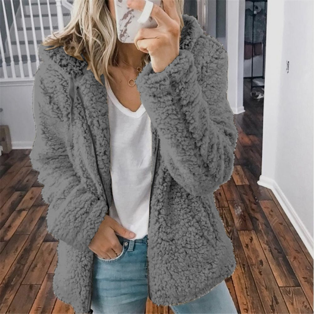 Warm winterkledingstuk: zacht teddy capuchonvest voor dames, heerlijk comfortabel.
