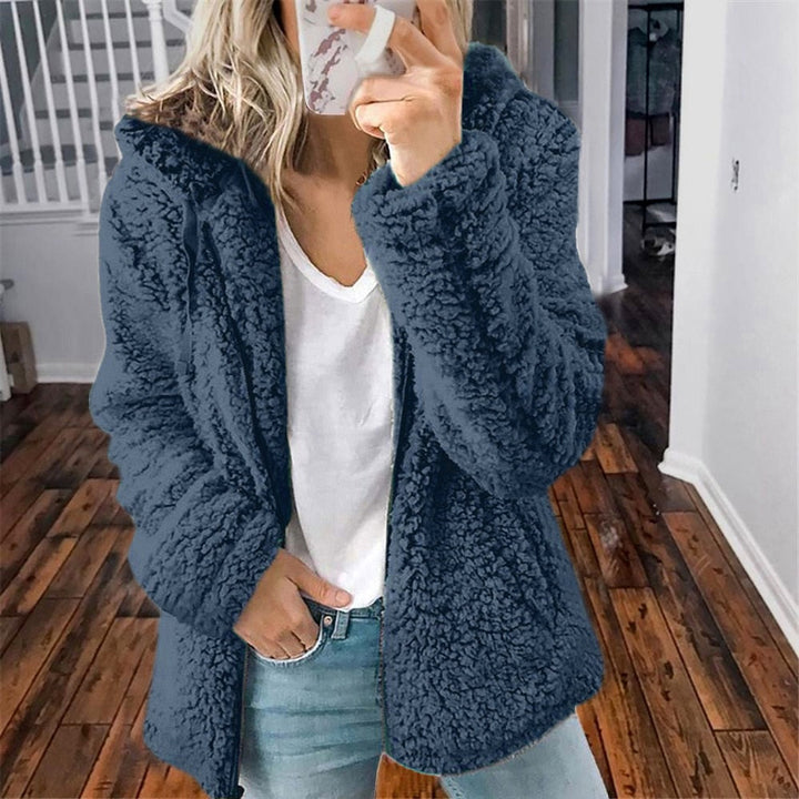 Comfortabel damesvest van zachte teddyfleece, ideaal als warm winterkledingstuk.