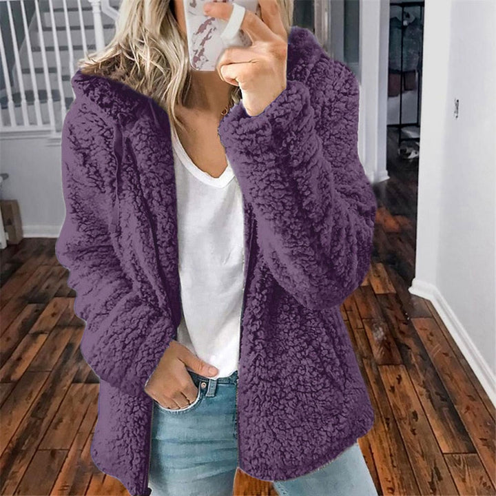 Dames warmvest met capuchon, gemaakt van superzachte teddyfleece, perfect voor comfort.