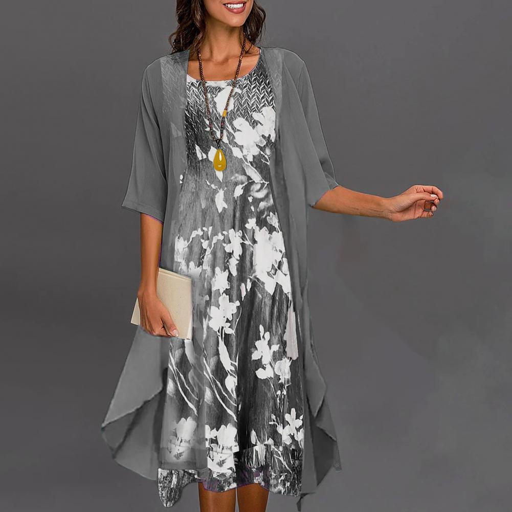 Comfortabele dames zomerjurk met elastische taille en bijpassend vest. Veelzijdig voor elke gelegenheid.