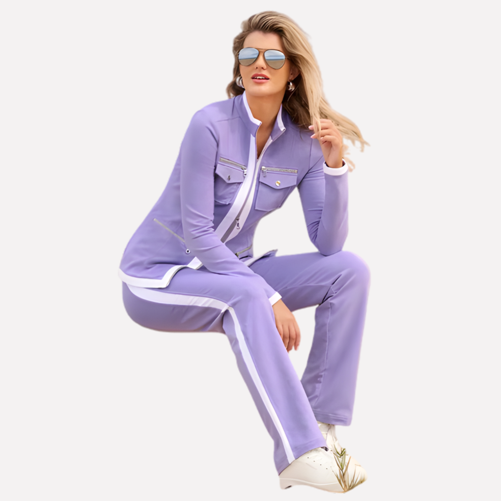 Sportieve dames trainingspak outfit, bestaande uit een jack en broek met trendy contrastrand. Ideaal voor casual mode.