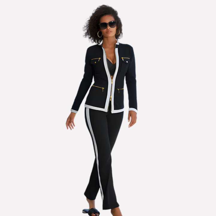 Veelzijdig dames trainingspak met comfortabel jack en broek. Sportieve set met contrast trim, ideaal voor casual mode.