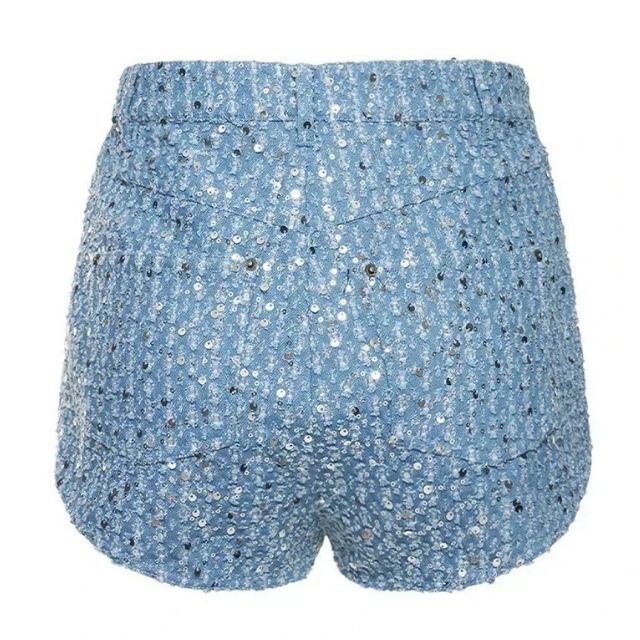 Blauwe tweedelige spijkerstof set met pailletten voor dames. Casual, trendy en comfortabel.