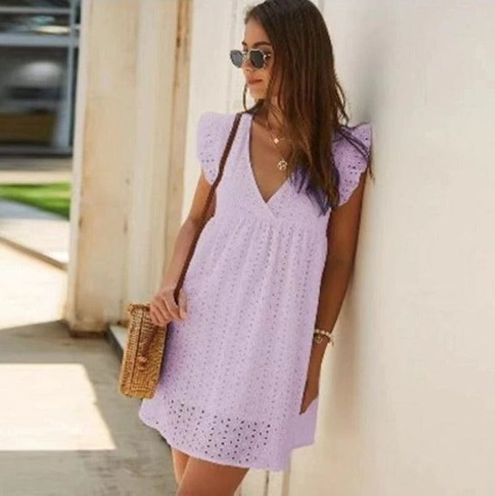 Trendy zomer minijurk voor dames, met speelse volantmouwen en comfortabele losse pasvorm.