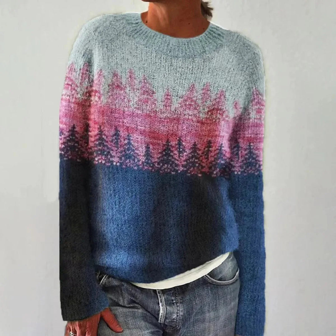 Gebreide dames trui met decoratief patroon. Stijlvolle en comfortabele keuze voor vrouwenmode.
