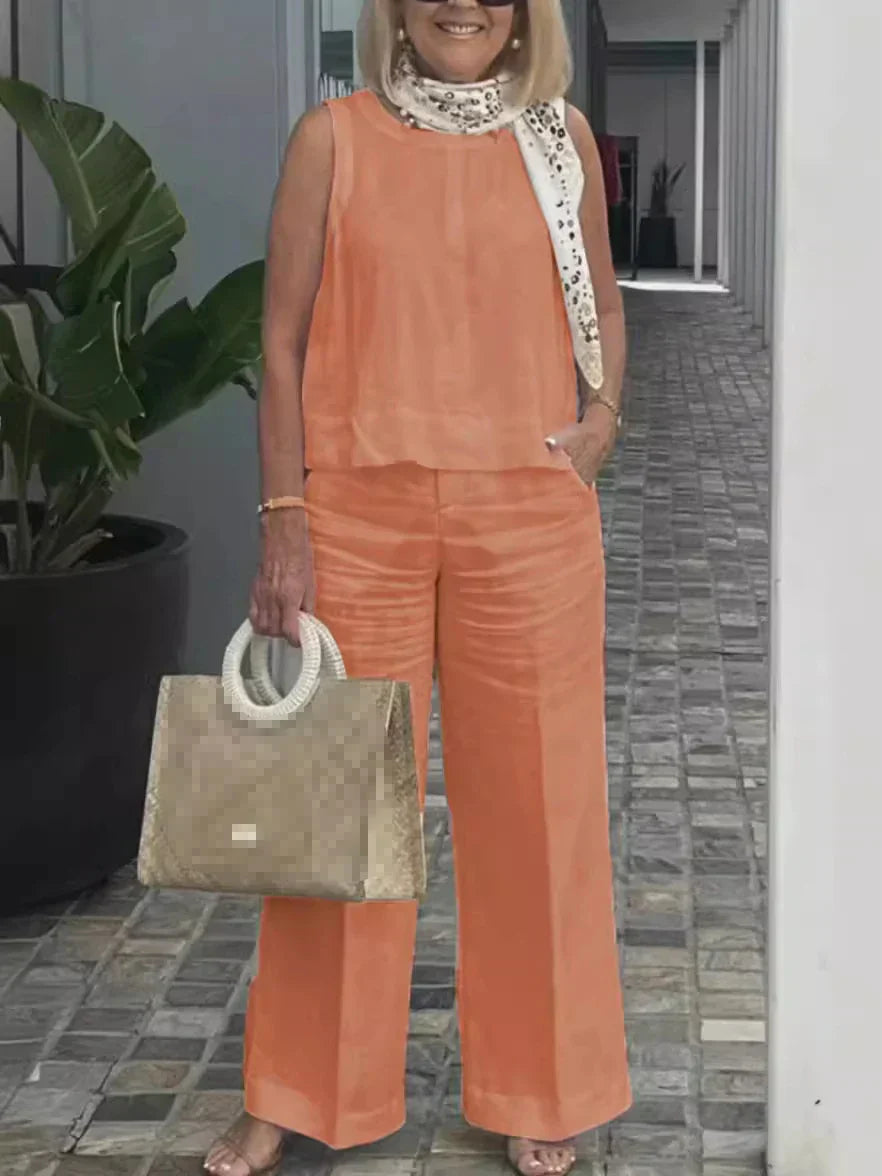 Stijlvolle dames tweedelige zomerset Maelis: linnen mouwloze top en bijpassende wijde broek, damesmode.