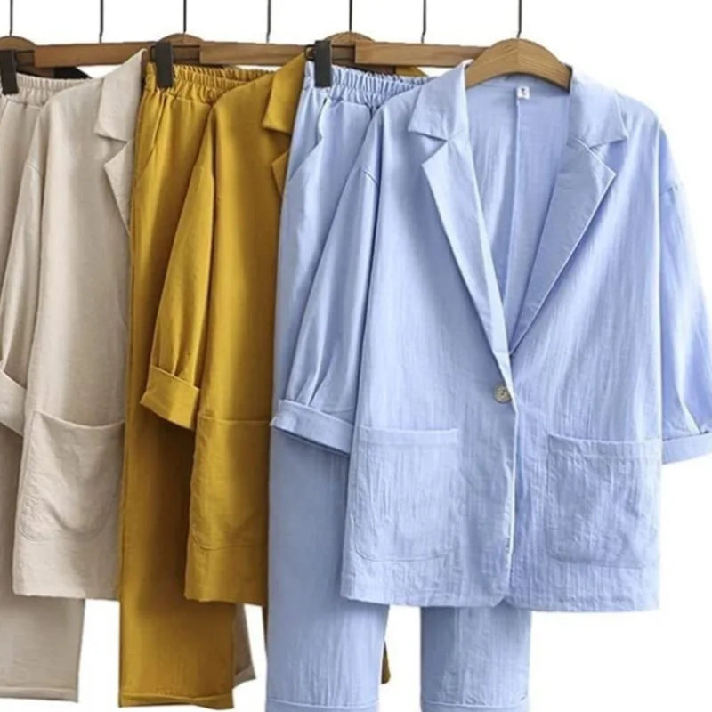 Veelzijdige dames loungewear set met elegant jasje en comfortabele rechte broek voor elke gelegenheid.