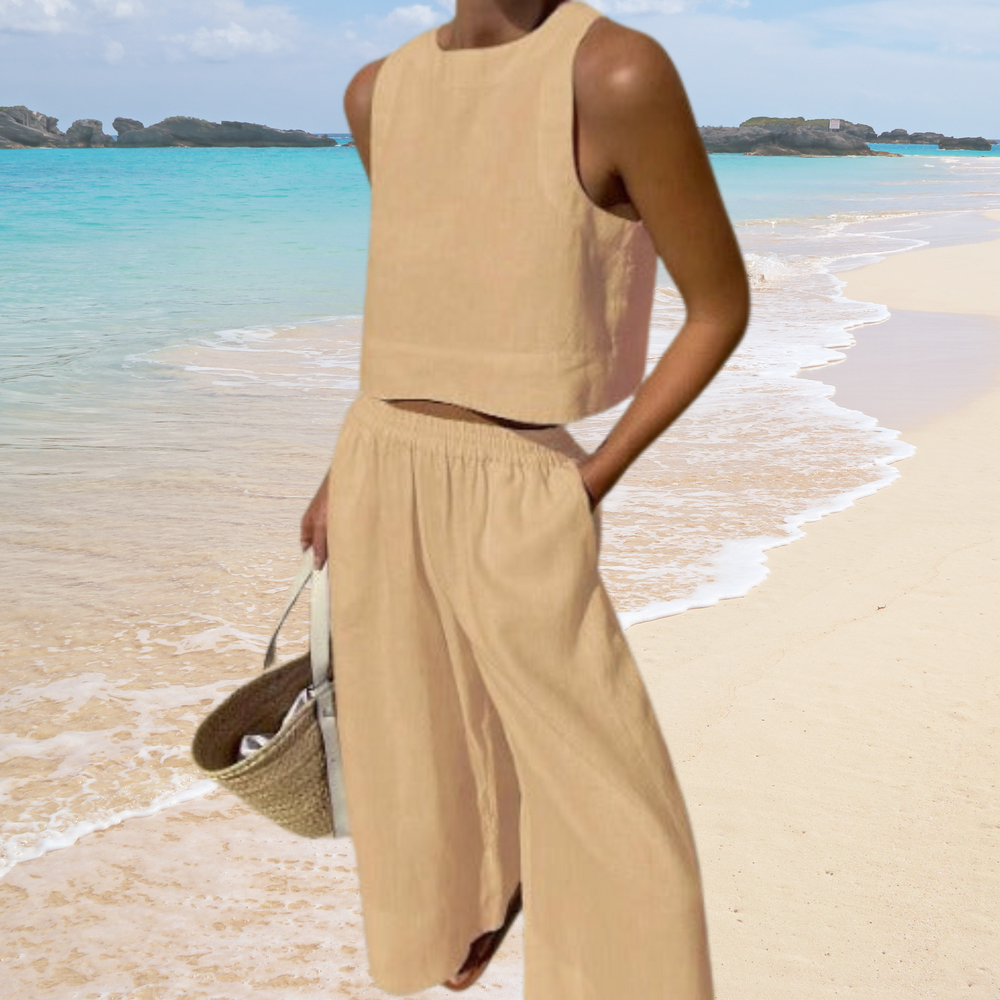 Casual-elegante dames zomerset met crop top & broek, ideaal voor zomerse dagen. Gemaakt van ademende katoenmix.