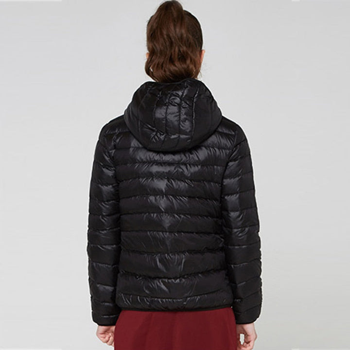 Elegante capuchonjas voor dames, ultralichte en stijlvolle winterkleding.