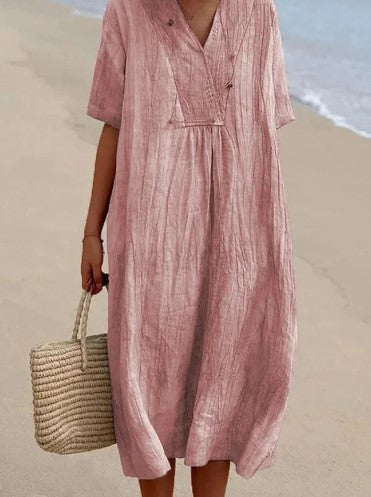 Deze stijlvolle dames V-hals A-lijn midi jurk combineert comfort met elegantie. Perfect voor een tijdloze look.