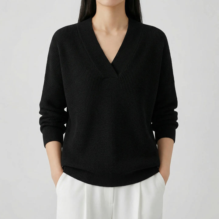 Nieuwe collectie dameskleding: V-hals top met strakke moderne pasvorm, zowel comfortabel als elegant.